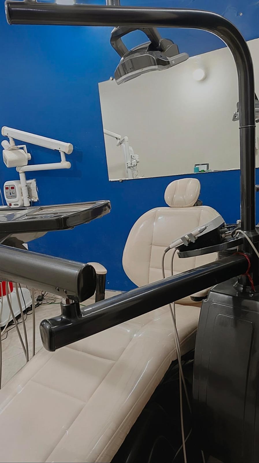 Treatment room with modern dental chair at Sony Dental Hospital