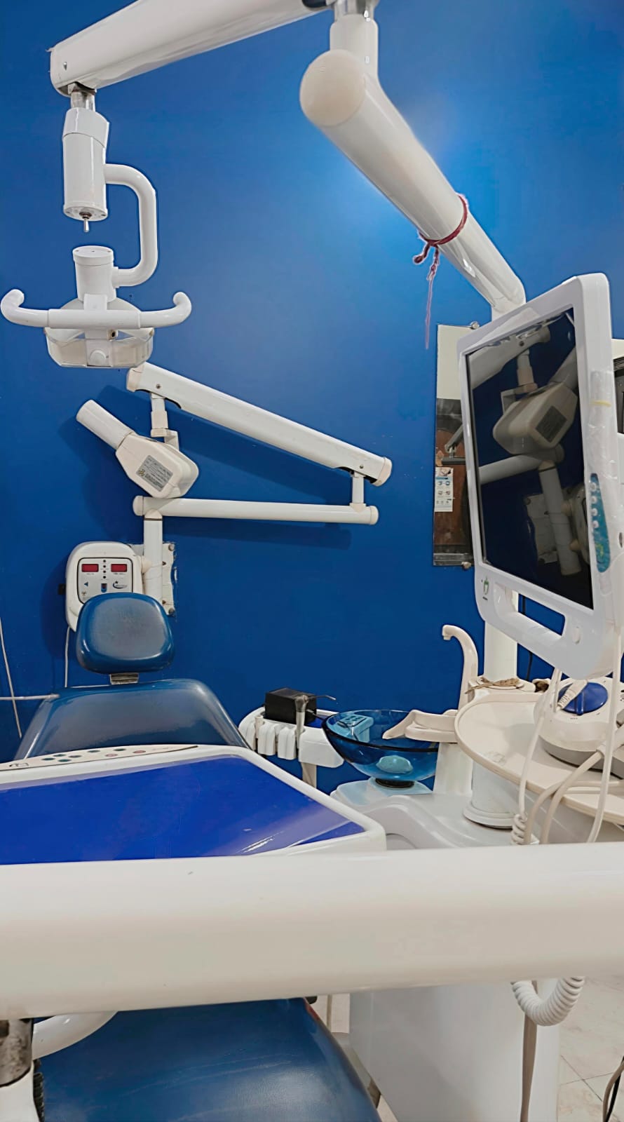 Treatment room with digital imaging screen at Sony Dental Hospital